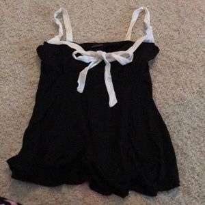 Black top with white trim has a very Chanel feel to it- never worn